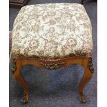 A Louis XVI style walnut stool, padded seat, French cabriole legs, gilt metal mounts throughout.