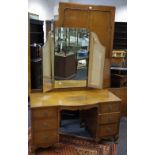 A Warring and Gillows burr walnut bedroom suite comprising single wardrobe,