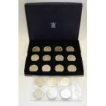 Coins - a Royal Mint box containing ten commemorative five pound coins;