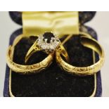 An 18ct gold sapphire and diamond chip ring, 3.5g, a pair of 9ct gold hoop earrings 2.3g.