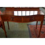 A George III design mahogany serpentine fronted serving table,