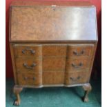 A 20th century walnut bureau,