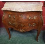 A 19th century kingwood, marquetry and gilt metal mounted bombé shaped commode,