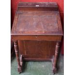 A 19th century mahogany Davenport,