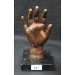 Demetre Chiparus, after, a bronze coloured metal model, of a slender hand, cast signature,