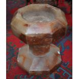 A Derbyshire alabaster font, octagonal top, conforming column and base, dished water receptacle,