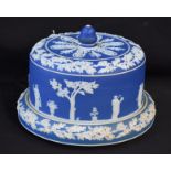 A Victorian Wedgwood Blue Jasperware cheese dome and stand