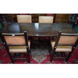 An oak trestle type dining table, rounded rectangular top, shaped end supports,