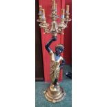 A pair of floor standing six branch figural 'candelabra', as a young girl, stepped circular base,