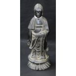 Chinese School, a dark patinated bronze, of Buddha, standing upon a lotus, 22.