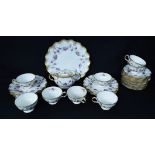 A Royal Crown Derby Royal Antoinette pattern part tea set including sugar bowl, cups, side plates,