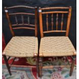 A near pair of rush seated country side chairs,