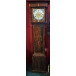 A 20th century oak longcase clock, 25cm dial with bold Roman numerals,