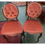 A pair of Victorian mahogany salon chairs, brass labels for TH Fillmer & Sons,