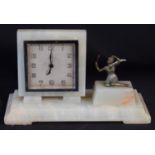 An Art Deco onyx eight day mantel time piece, the square dial with chrome frame, Arabic numerals,