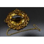 A large 19th century orangey yellow citrine brooch,