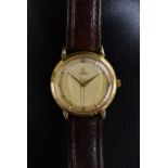 Omega - a vintage 1950s automatic 18ct gold cased wristwatch, two tone textured silvered dial,