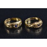 Rings - a diamond and blue sapphire trilogy ring, central round cut pale blue sapphire,