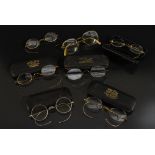 Spectacles - a pair of vintage 12ct gold plated and gilt metal framed oval spectacles,