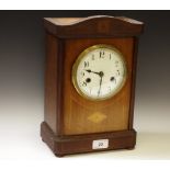 An Edwardian mantel clock, enamel dial, twin winding holes, central diamond shaped satinwood patera,