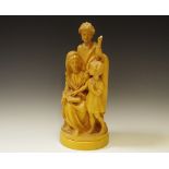 Continental School, 20th century a hand carved softwood family group, plinth base 29cm high.
