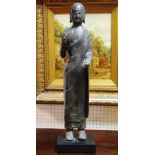 Interior design - a free standing figure of Buddha, plinth base, Initialed MMA.