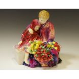 A Royal Doulton figure, Flower Seller's Children, 22cm high,