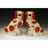 A pair of large Victorian Staffordshire chimney spaniels