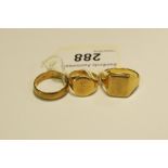 A 9ct gold gentleman's signet ring; a 9ct gold half barrel wedding band;