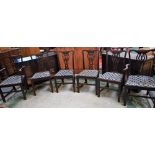 A set of six Chippendale Revival mahogany dining chairs,