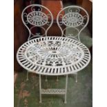 A contemporary cast metal garden table;