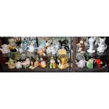 Novelty ceramic teapots including sphinx, rabbit, cat, Punch, Mad Hatter, postman, skier, etc,
