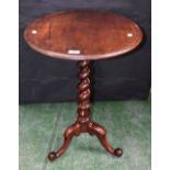 A 19th century mahogany wine/occasional table, near-circular top, spirally turned column,