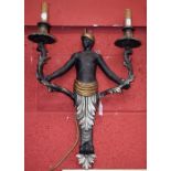 A pair of contemporary composition two light two branch 'Blackamoor' wall sconces,