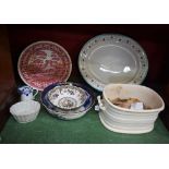 A Staffordshire two handled footman; a large Royal Worcester meat plate; a blue and white washbowl;