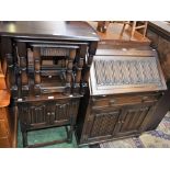 An oak Old Charm linen fold bureau,