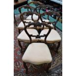 A set of six Victorian mahogany dining chairs,