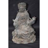 Asian School, modern, a bronzed figure, Guanyin, seated, 23.