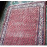 A Middle Eastern hand knotted carpet,
