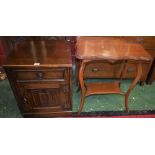 An oak side cabinet, rectangular top above a long drawer and a linenfold cupboard door,