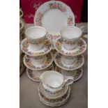 A Paragon Country Lane pattern part tea service, comprising six teacups, saucers and tea plates,