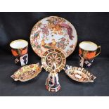 A Royal Crown Derby 1128 pattern trinket dish; a similar candle snuffer and pin tray;