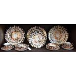 A Royal Crown Derby 1128 pattern two-handled soup dish on stand; another 2451 pattern;