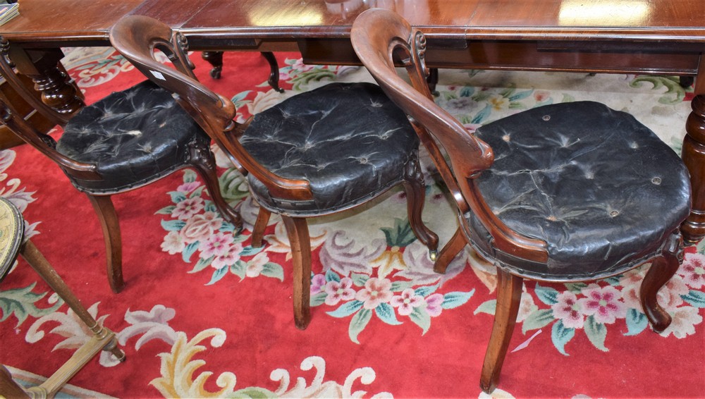 A set of six Victorian mahogany dining chairs, curved cresting rail supported by scrolling acanthus,