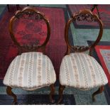 A pair of Victorian style mahogany side chairs (2)