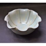 A Chinese pottery celadon glazed song bowl, ridged lobed body, crackle glaze, unmarked, 15.