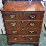 A reproduction walnut cellaret, as a chest of drawers,