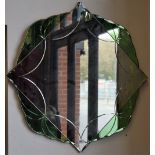 An Art Deco style wall mirror, tinted glass,