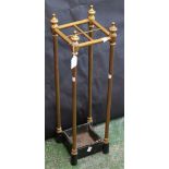 A cast iron and brass walking stick stand, urnular finials, 62.