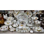 A Royal Worcester Evesham pattern dinner service, including lidded tureens, casserole dishes,